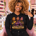 Never Let Go Dream Weavers trio lightweight hoodie in black, worn at a nail salon