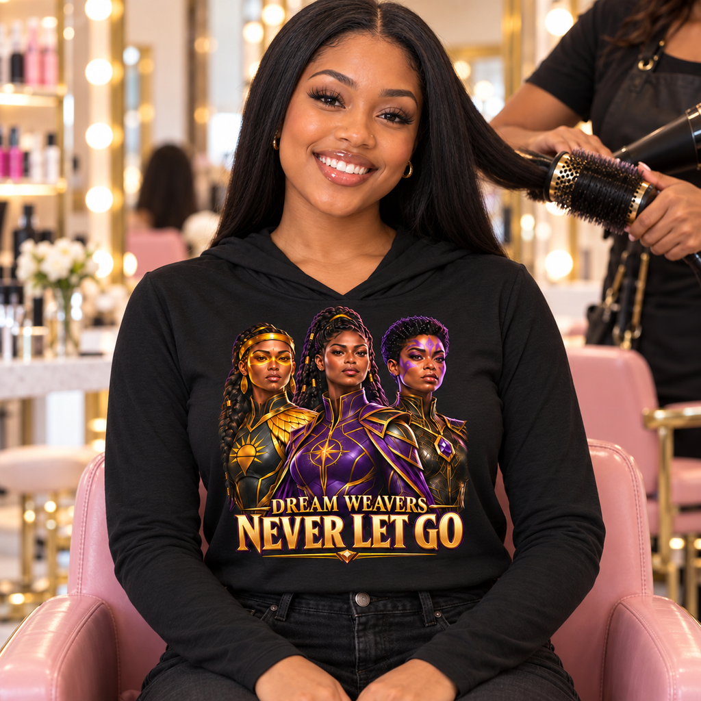 Never Let Go Dream Weavers trio lightweight hoodie in black, worn at a hair salon